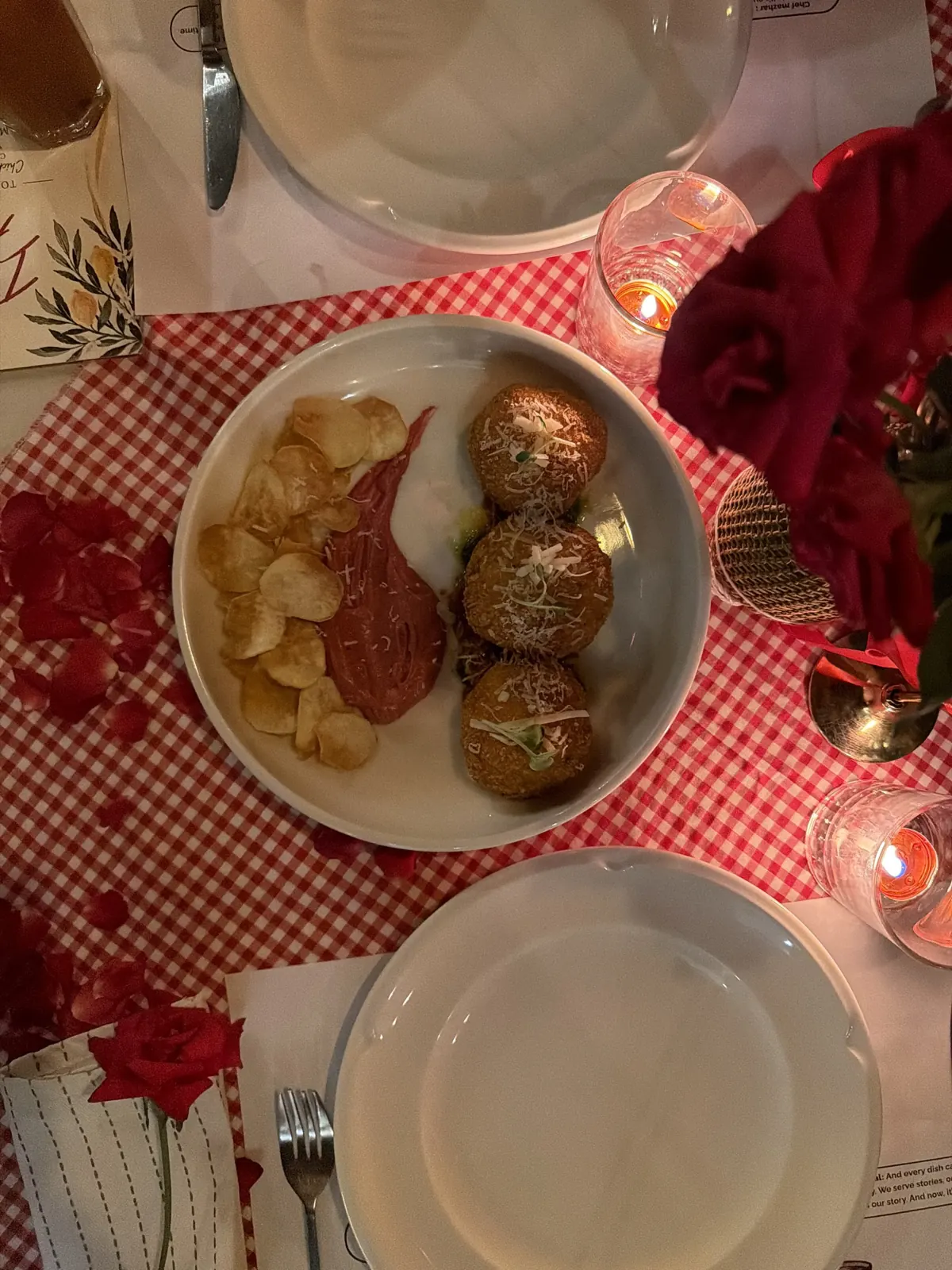 Chicken and mozzarella croquettes on a white plate