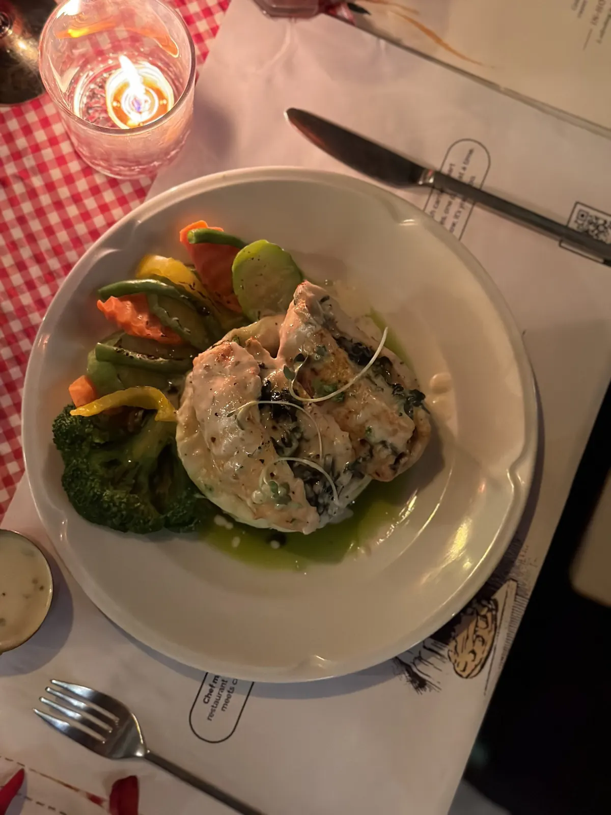 Pollo Ripieno with vegetables on the Date Club table